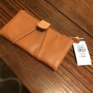 Wilson’s leather tan wallet. Brand new.